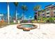 A community hot tub in a fenced area features ample lounge chairs and the view of the bay at 95 N Marion Ct # 226, Punta Gorda, FL 33950
