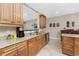 Functional kitchen featuring granite countertops, stainless steel appliances, and custom wood cabinetry at 95 N Marion Ct # 226, Punta Gorda, FL 33950