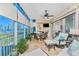 Spacious enclosed lanai featuring comfortable seating and lovely water view at 95 N Marion Ct # 226, Punta Gorda, FL 33950