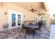 Inviting outdoor patio area with comfortable seating, ceiling fans, and a view of the pool at 95 N Marion Ct # 226, Punta Gorda, FL 33950