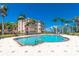 Refreshing community pool area with ample seating, a well-maintained pool, and a bright, sunny atmosphere at 95 N Marion Ct # 226, Punta Gorda, FL 33950