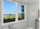 Picture window overlooking the bay with water and greenery at 95 N Marion Ct # 226, Punta Gorda, FL 33950