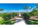 Scenic boardwalk path surrounded by lush greenery offers a serene escape and connection with nature at 95 N Marion Ct # 226, Punta Gorda, FL 33950