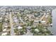 Property aerial featuring waterfront homes with boat docks and canal access at 103 Curtis Ne Ter, Port Charlotte, FL 33952