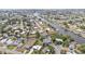 Stunning aerial view of a waterfront community with canals and private docks on a sunny day at 103 Curtis Ne Ter, Port Charlotte, FL 33952