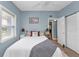 Cozy bedroom with a calming atmosphere, natural light, and comfortable decor at 103 Curtis Ne Ter, Port Charlotte, FL 33952