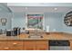 Kitchen featuring granite countertops, undermount sink and stainless steel dishwasher at 103 Curtis Ne Ter, Port Charlotte, FL 33952