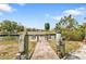 Private dock on a waterway, offering direct access for boating and a serene waterfront lifestyle at 103 Curtis Ne Ter, Port Charlotte, FL 33952