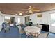 Sunroom featuring large windows and views of the outdoor landscape at 103 Curtis Ne Ter, Port Charlotte, FL 33952
