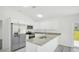 Modern kitchen with stainless steel appliances and granite countertops at 11456 5Th Ave, Punta Gorda, FL 33955