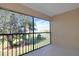 Screened balcony provides views of lush greenery and natural light at 1211 Saxony Cir # B5, Punta Gorda, FL 33983