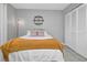 Spacious bedroom with a full-size bed, ample closet space, and bright walls at 1211 Saxony Cir # B5, Punta Gorda, FL 33983