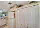 Bright kitchen featuring a refrigerator and a pantry at 1235 Saxony Cir # 5202, Punta Gorda, FL 33983