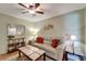 Cozy living room with a comfortable sofa, stylish coffee table, and decorative wall art creating a relaxing ambiance at 1235 Saxony Cir # 5202, Punta Gorda, FL 33983