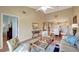 Well-lit living room with vaulted ceilings, contemporary décor, and an open layout at 1235 Saxony Cir # 5202, Punta Gorda, FL 33983