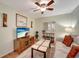 Cozy living room with comfortable seating, television, and decor at 1235 Saxony Cir # 5202, Punta Gorda, FL 33983