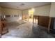 Empty dining area under renovation featuring tile floors, potential for an open design, and ample light at 134 Peace Island Dr, Punta Gorda, FL 33950