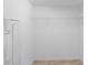 Walk in closet with wire shelving and neutral colored tile flooring at 14617 Sycamore Ct # 2211, Punta Gorda, FL 33955