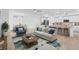 Open-concept living space with modern furnishings, flowing seamlessly into the kitchen and dining areas at 14617 Sycamore Ct # 2211, Punta Gorda, FL 33955