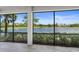 Enclosed patio with a beautiful view of the lake at 14617 Sycamore Ct # 2211, Punta Gorda, FL 33955