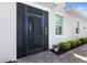 Close-up of the screened-in front porch and the lovely brick paver walkway to the home at 14617 Sycamore Ct # 2211, Punta Gorda, FL 33955