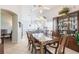 Open-concept dining area adjacent to a modern kitchen and bright living space at 1872 Birmingham Blvd, Port Charlotte, FL 33980
