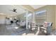 Balcony view extends from the living room to the exterior, providing seamless indoor/outdoor experience at 19325 Water Oak Dr # 305, Port Charlotte, FL 33948
