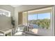 Relaxing screened balcony with comfortable seating overlooking a serene water view at 19325 Water Oak Dr # 305, Port Charlotte, FL 33948