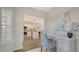 Office space with desk and chair, wood flooring, and an open view to the kitchen at 19325 Water Oak Dr # 305, Port Charlotte, FL 33948