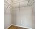 A small empty walk-in closet featuring wire shelving and wood floors at 19325 Water Oak Dr # 305, Port Charlotte, FL 33948
