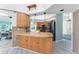 Open kitchen featuring granite counters, stainless appliances, and ample counter space, perfect for entertaining and cooking at 2244 Meetze St, Port Charlotte, FL 33953