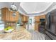 Bright kitchen with granite counters, stainless appliances, and views of the pool, blending style and functionality at 2244 Meetze St, Port Charlotte, FL 33953