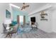Bright living room with vaulted ceilings, modern decor, and stylish furnishings with serene color palette at 2244 Meetze St, Port Charlotte, FL 33953