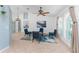 Bright living room featuring neutral walls, tile floors, and ample natural light at 2244 Meetze St, Port Charlotte, FL 33953
