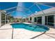 Screened-in pool and patio area featuring a serene and private backyard retreat at 2244 Meetze St, Port Charlotte, FL 33953