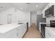 Bright, modern kitchen with quartz countertops and stainless-steel appliances at 2300 Nordendale Blvd, North Port, FL 34288