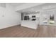 Modern kitchen with stainless steel appliances, quartz countertops, and ample storage at 2300 Nordendale Blvd, North Port, FL 34288