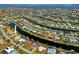 Wide aerial shot of canal-front homes, highlighting the waterfront living and community layout at 2310 El Cerito Ct, Punta Gorda, FL 33950