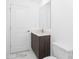Bathroom with modern vanity, faucet and countertop with tile floors at 24294 Santa Inez Rd, Punta Gorda, FL 33955