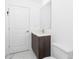 Bathroom with modern vanity, faucet and countertop with tile floors at 24294 Santa Inez Rd, Punta Gorda, FL 33955