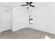 Bedroom featuring neutral paint, tile floors, recessed lights, ceiling fan and a double door closet at 24294 Santa Inez Rd, Punta Gorda, FL 33955