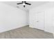 Bedroom featuring neutral paint, tile floors, recessed lights, ceiling fan and a double door closet at 24294 Santa Inez Rd, Punta Gorda, FL 33955