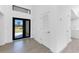 Bright entryway with high ceilings, tiled floors, and a view to the yard at 24294 Santa Inez Rd, Punta Gorda, FL 33955