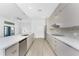Bright kitchen features modern appliances, sleek countertops, and a stylish open layout, perfect for cooking and entertaining at 24294 Santa Inez Rd, Punta Gorda, FL 33955