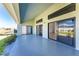 Spacious covered patio perfect for entertaining, with views of the beautiful backyard at 24294 Santa Inez Rd, Punta Gorda, FL 33955
