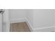 This walk-in closet has light hardwood floors and white base trim at 24294 Santa Inez Rd, Punta Gorda, FL 33955