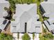 Birds eye view of the roof, driveway, and surrounding landscape of townhomes at 25559 Heritage Lake Blvd # 25, Punta Gorda, FL 33983