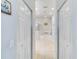 Hall view of the bathroom featuring a tub and shower at 25559 Heritage Lake Blvd # 25, Punta Gorda, FL 33983
