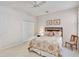 Calm bedroom featuring a queen bed and closet space at 25559 Heritage Lake Blvd # 25, Punta Gorda, FL 33983