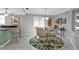 Eat-in kitchen with table, chairs, counter seating, and pendant lighting at 3106 Heron Shores Dr, Venice, FL 34293